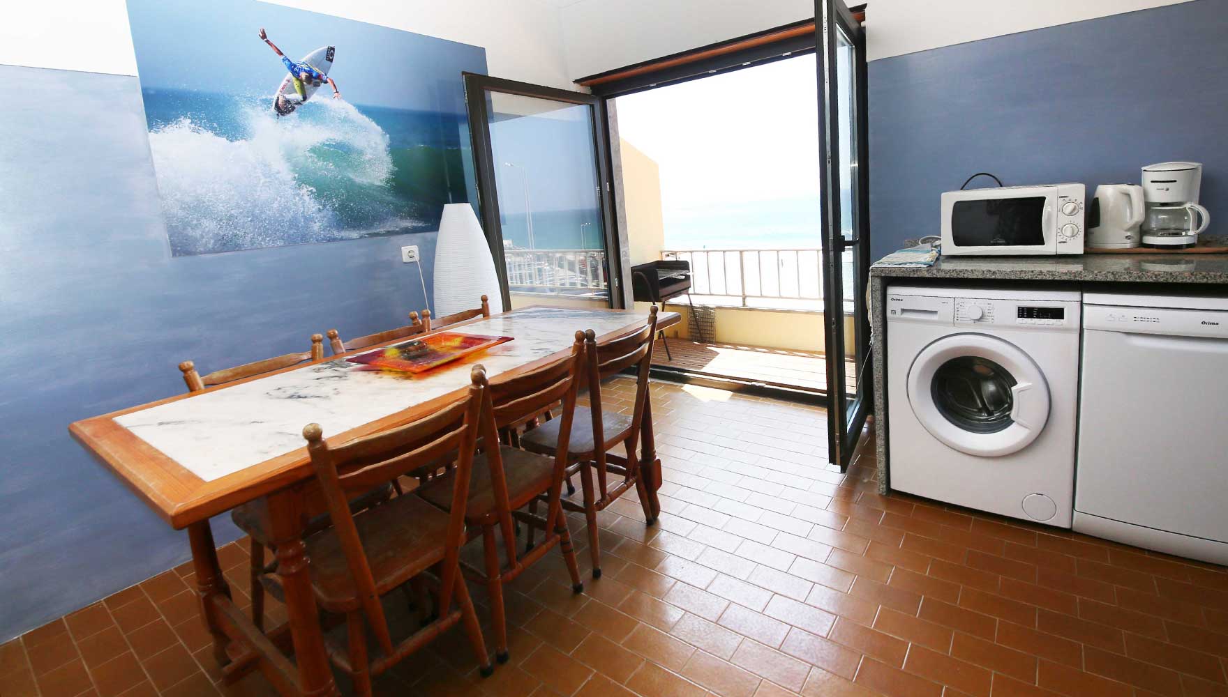 kitchen withpanorama window and outside deck